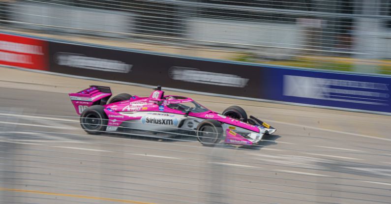 Call-to-action - A racing car is driving down a track